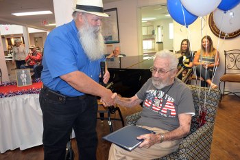 Hanford's venerable Jack Schwartz celebrates his 103rd birthday with friends and family Kings County Supervisor Joe Neves presents a county proclamation to 103-year-old Jack Schwartz during his birthday celebration April 28 at The Remington.
